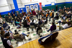 A group of students playing orchestra instruments